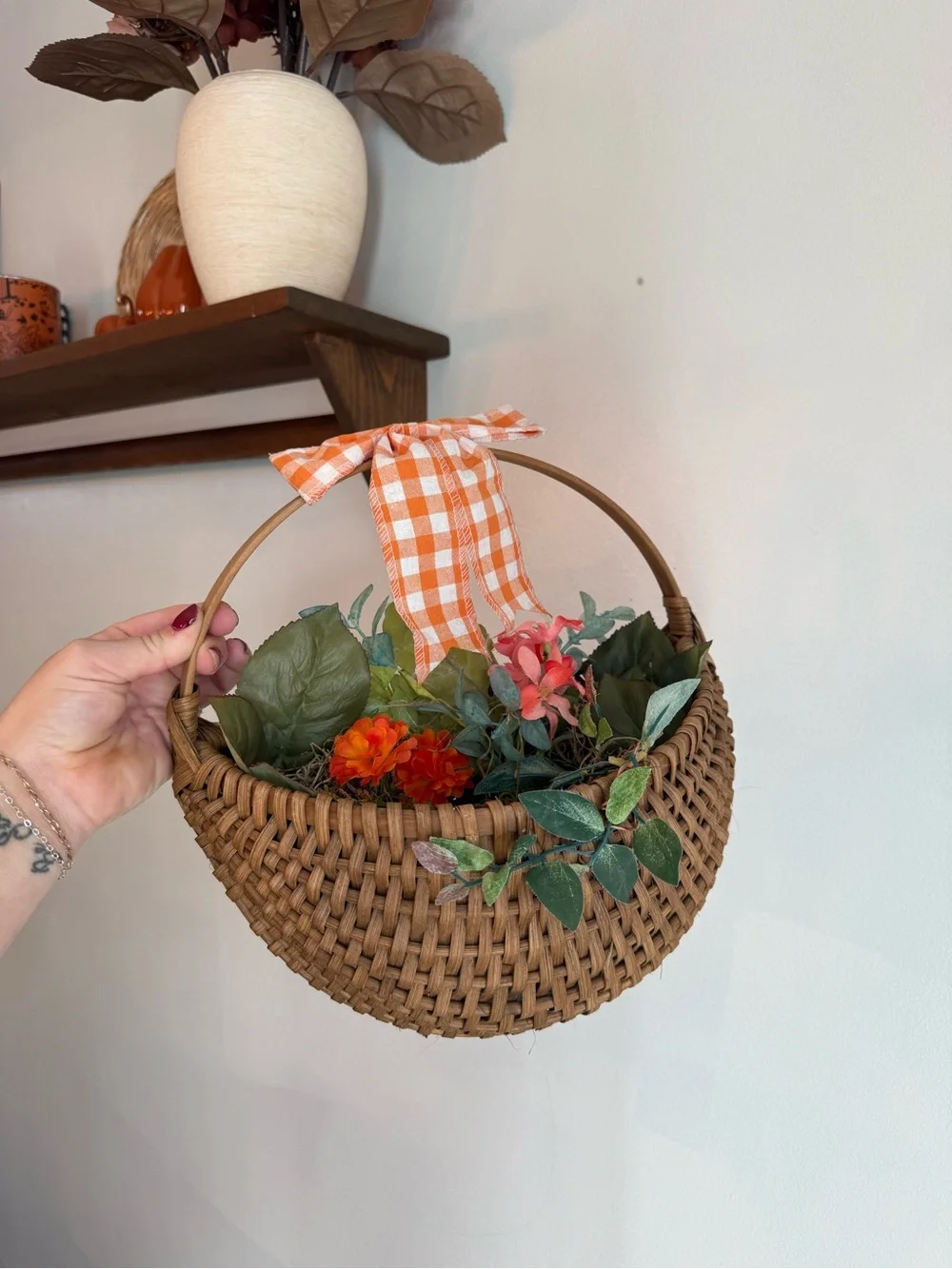 Woven Brown Hanging Basket with Orange Gingham Bow and Faux Floral Accents
